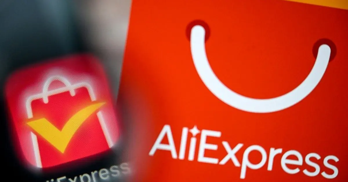 AB'nin AliExpress'e kesilen rekor cezaya ilişkin haber başlığı yazılı gazete küpürü ve logo detayları