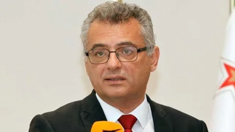 Erhürman konuşurken arama kurtarma çalışmalarının sürdüğünü vurguluyor