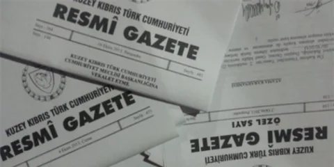 Erhürman ve ilgili yetkililerin imza süreci ile resmi gazete ilanına dair belge görüntüsü