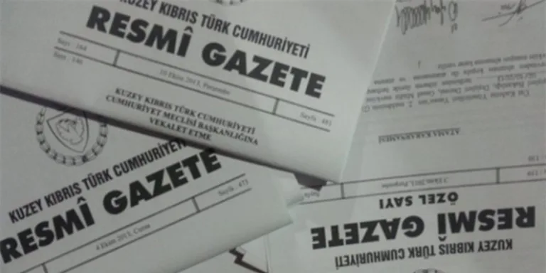 Erhürman ve ilgili yetkililerin imza süreci ile resmi gazete ilanına dair belge görüntüsü
