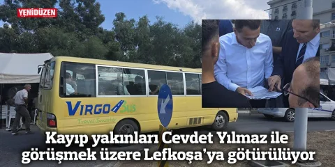 Kayıp yakınları, Cevdet Yılmaz ile görüşmek üzere Lefkoşa’ya götürülürken görüntüleniyor