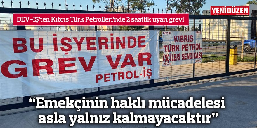 DEV-İŞ üyeleri Kıbrıs Türk Petrolleri önünde toplanmış; pankart ve flamalarla uyarı grevi gerçekleştiriyor