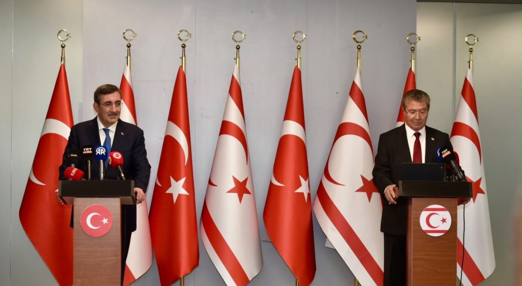 Yılmaz ve Üstel Ercan Havalimanı’nda düzenlenen basın toplantısında konuşuyor