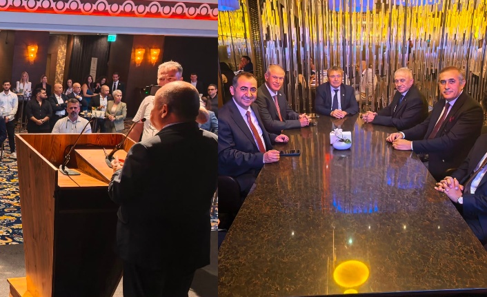 Aynı milletin fertleriyiz yazılı pankart veya afişin göründüğü kare