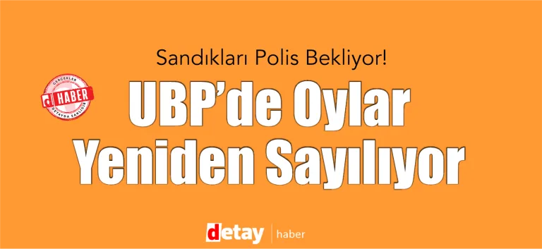 Polis ekipleri, oy sandıklarının güvenliğini sağlamak için beklerken sokakta sıra halinde duruyor