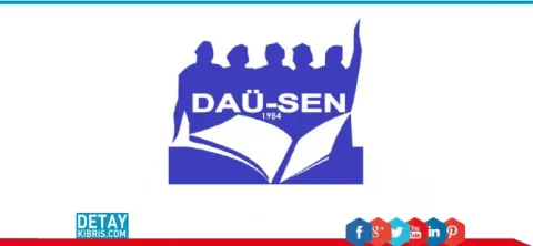 DAÜ-SEN üyeleri rektörlük önünde eylem düzenliyor, pankartlar ve grup topluluğu görünümü